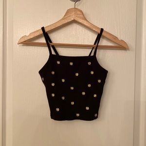 Black crop top with sunflower accents